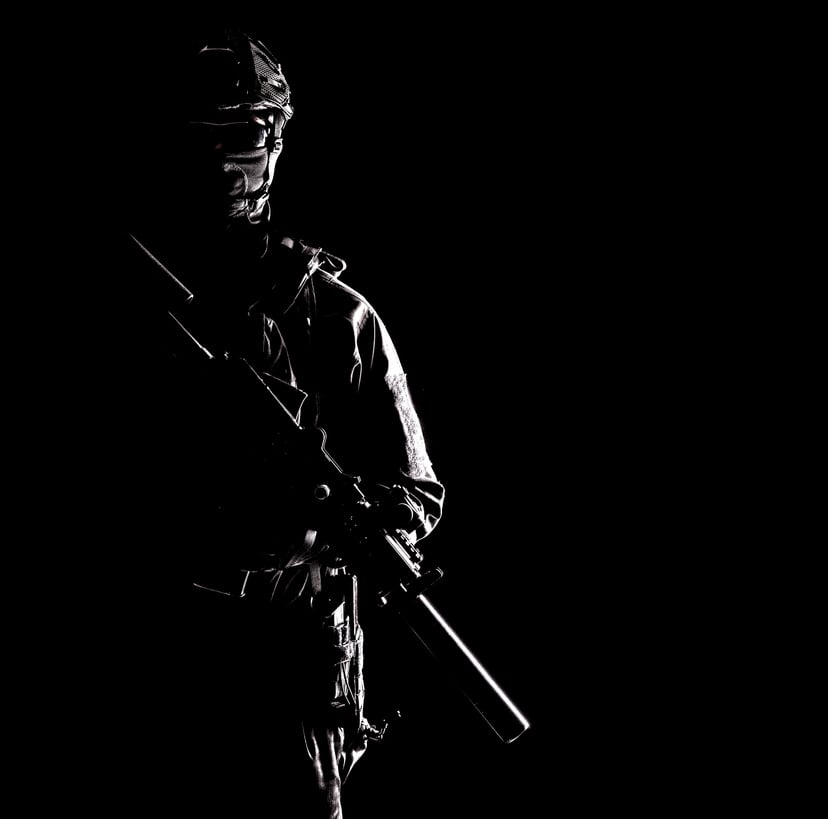 Backlit Silhouette of Private Military